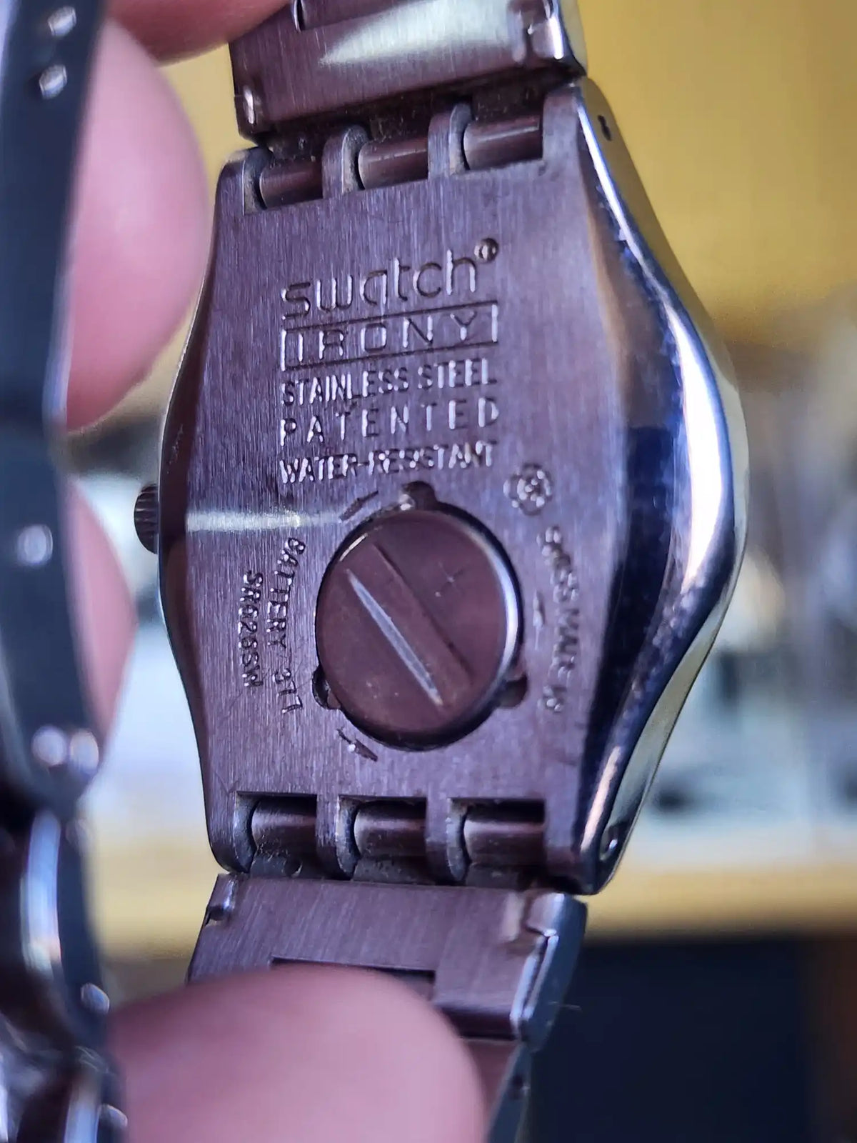 Swatch black dial small numbers women