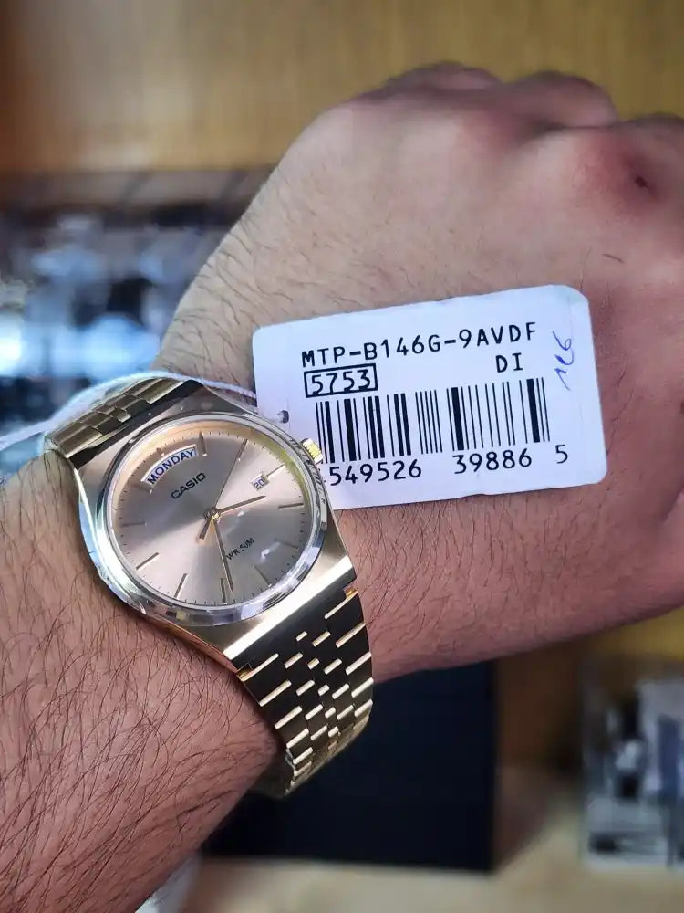 Casio mtp b146 gold daydate