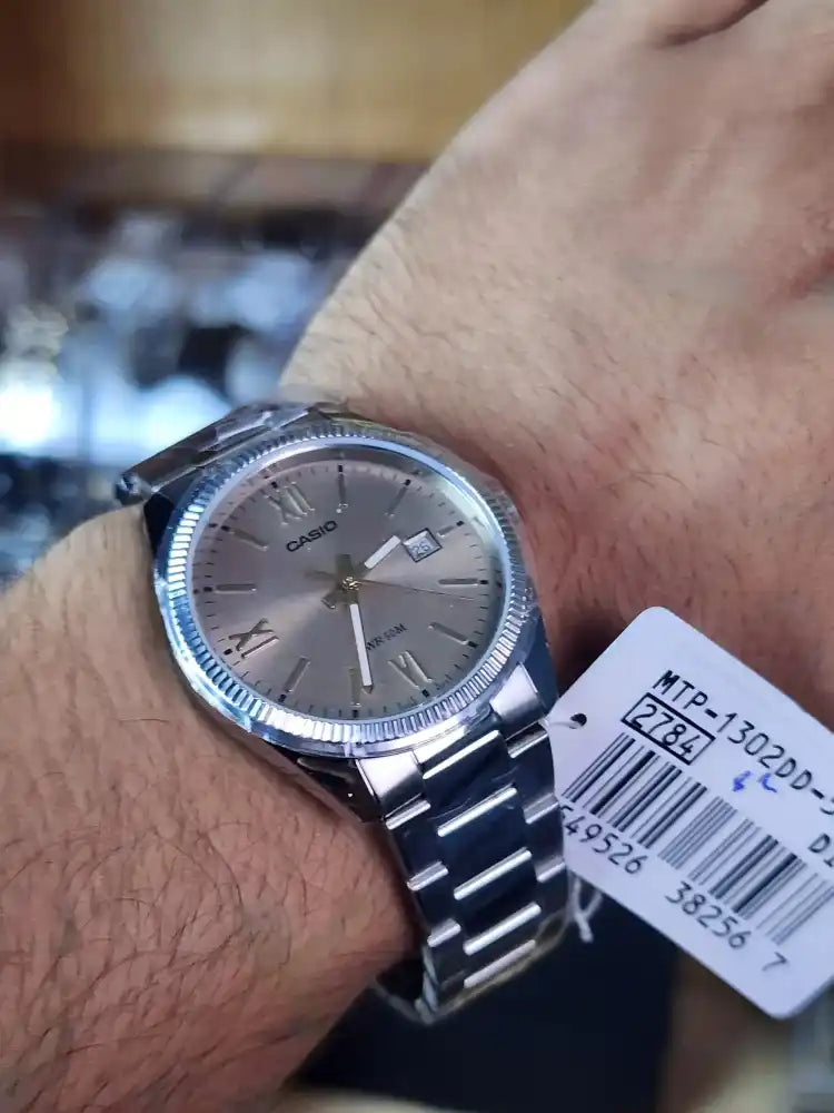 Casio MTP 1302 light beige dial