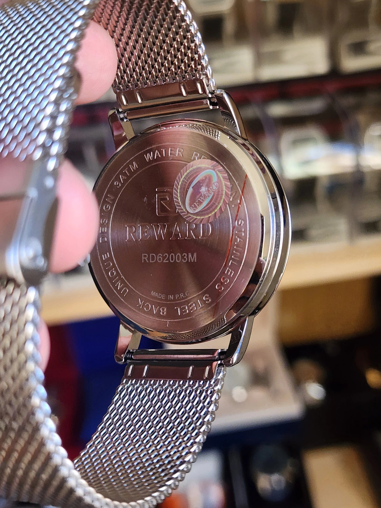 Reward silver skeleton dial