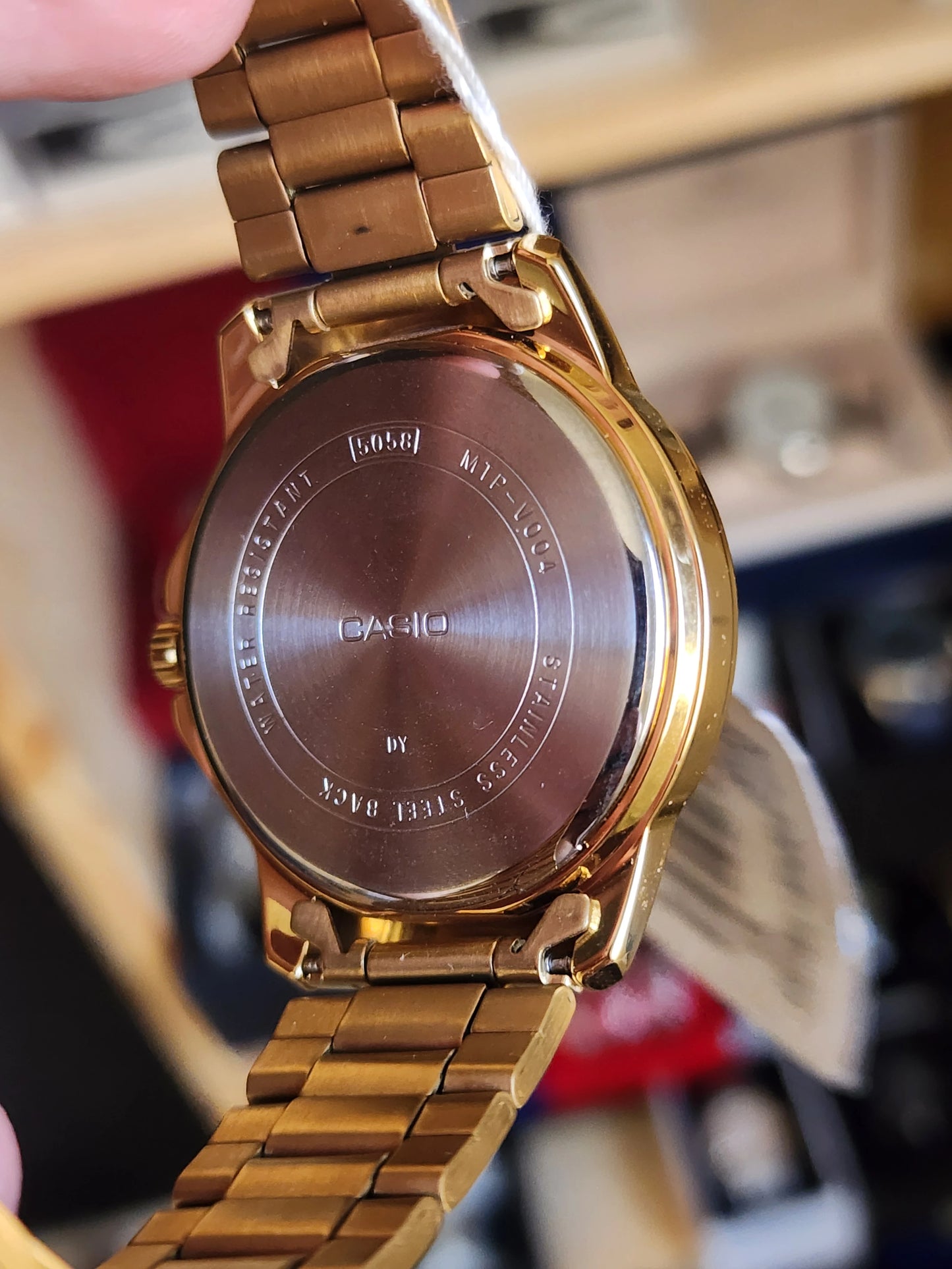 Casio mtp v004 gold black dial