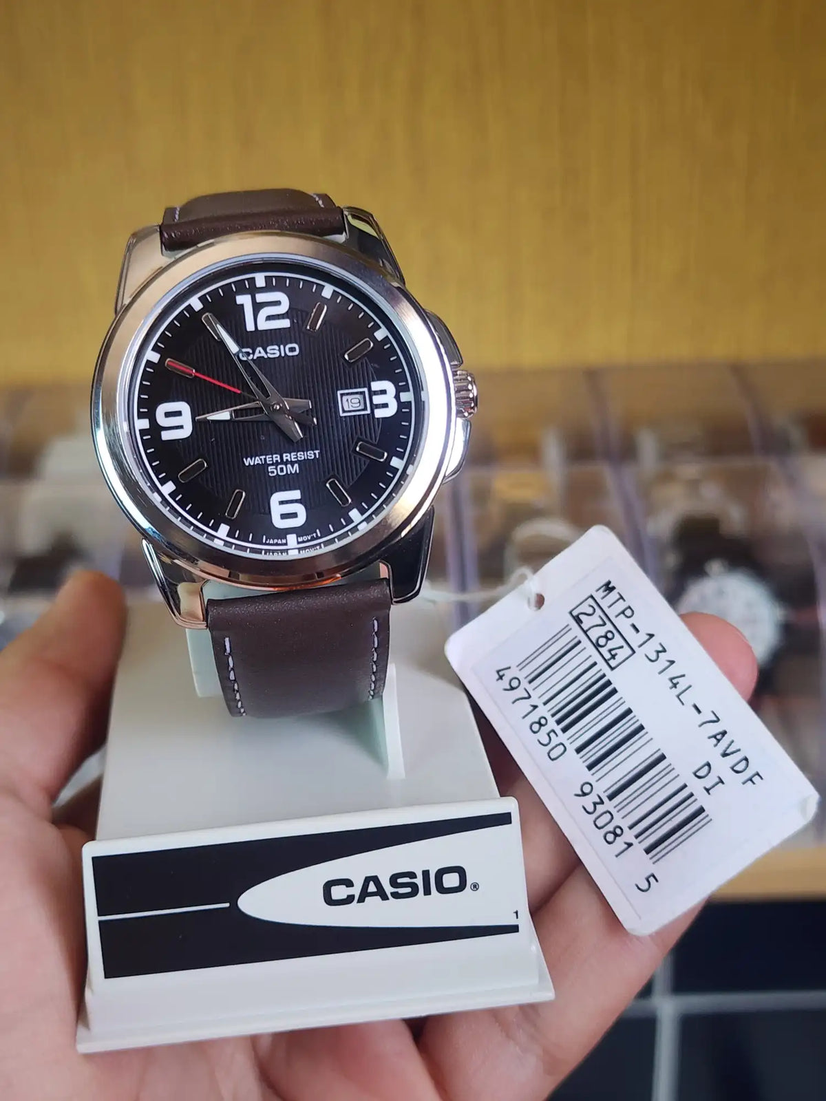 Casio MTP 1314 brown leather black dial
