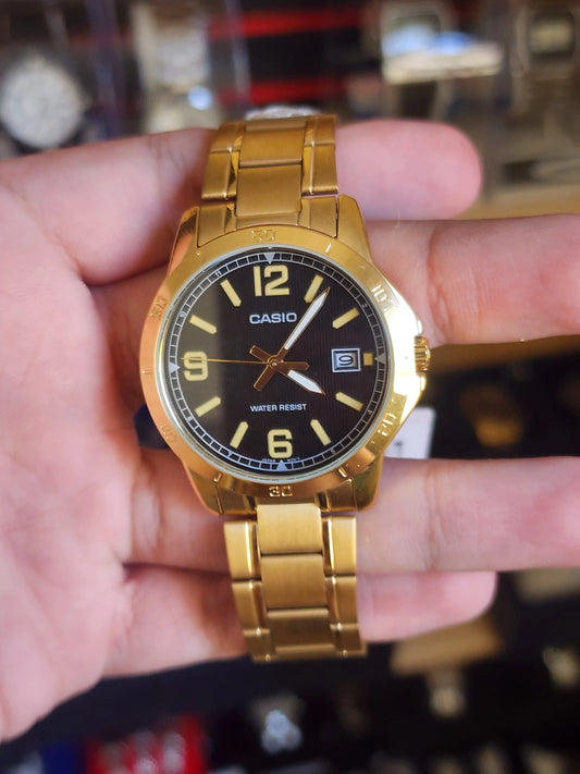 Casio mtp v004 gold black dial