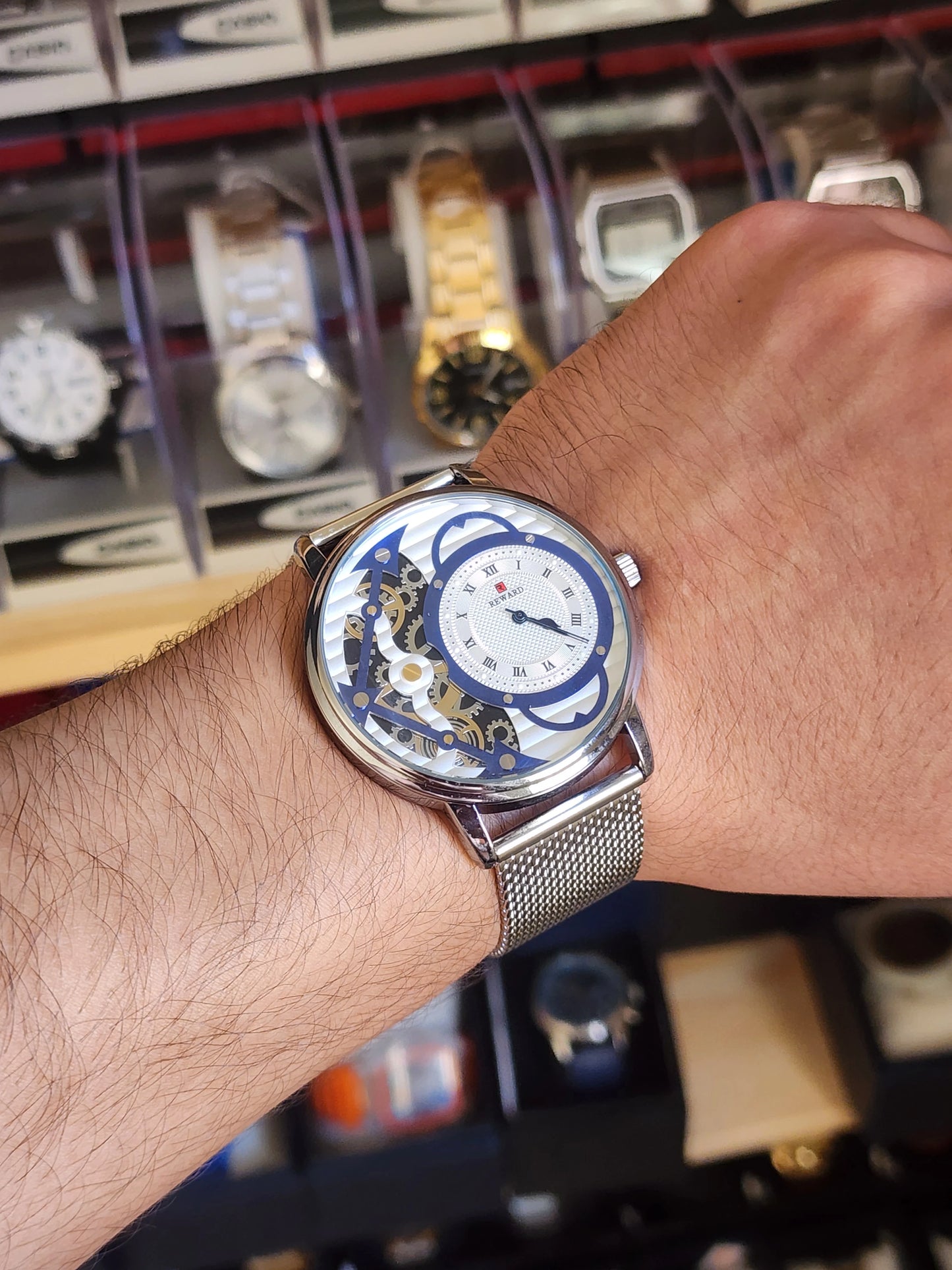 Reward silver skeleton dial