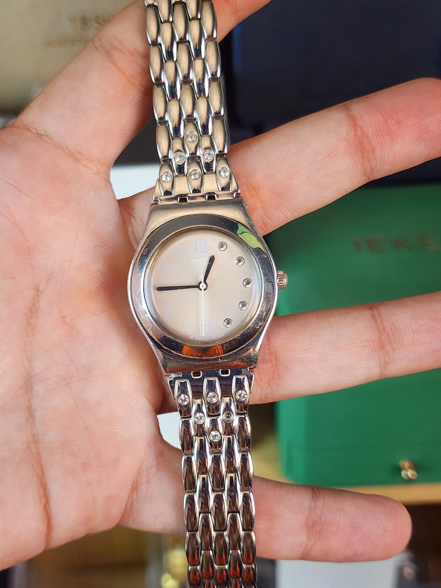 Swatch women half diamond dial