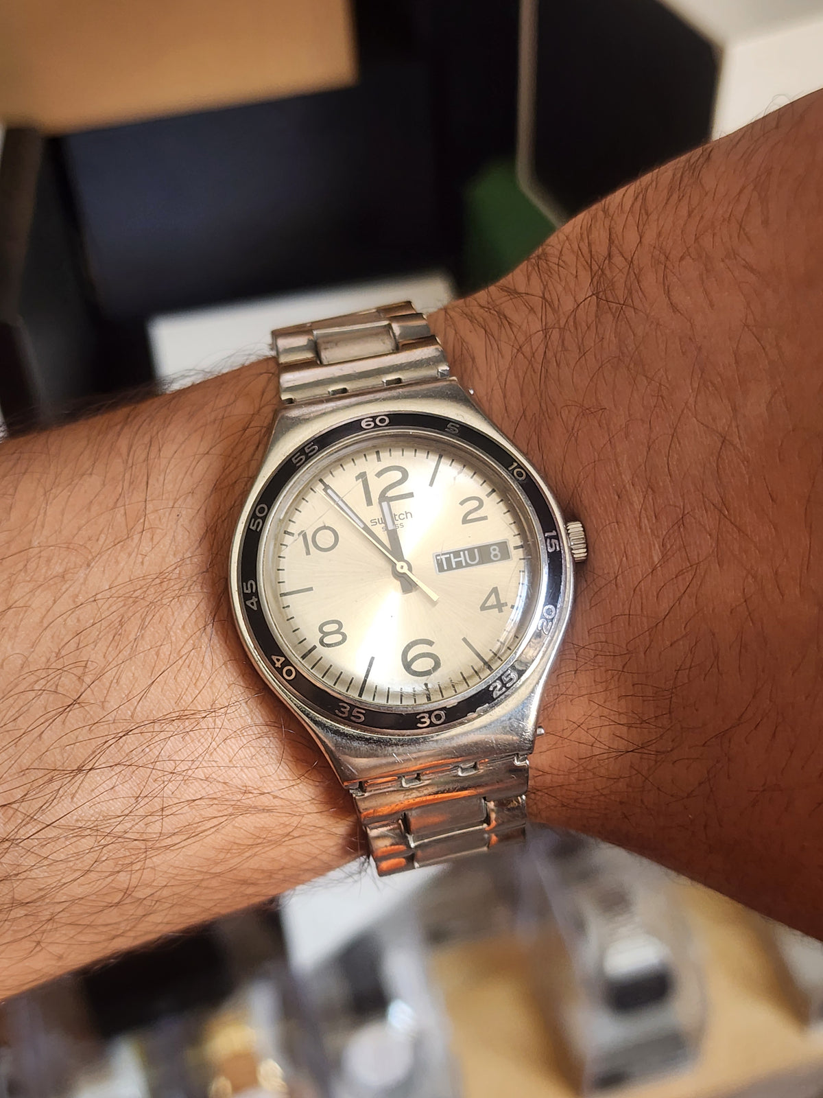Swatch beige dial black circle