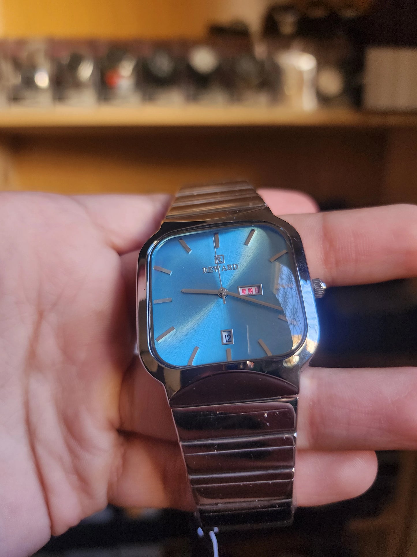Reward square turquoise dial