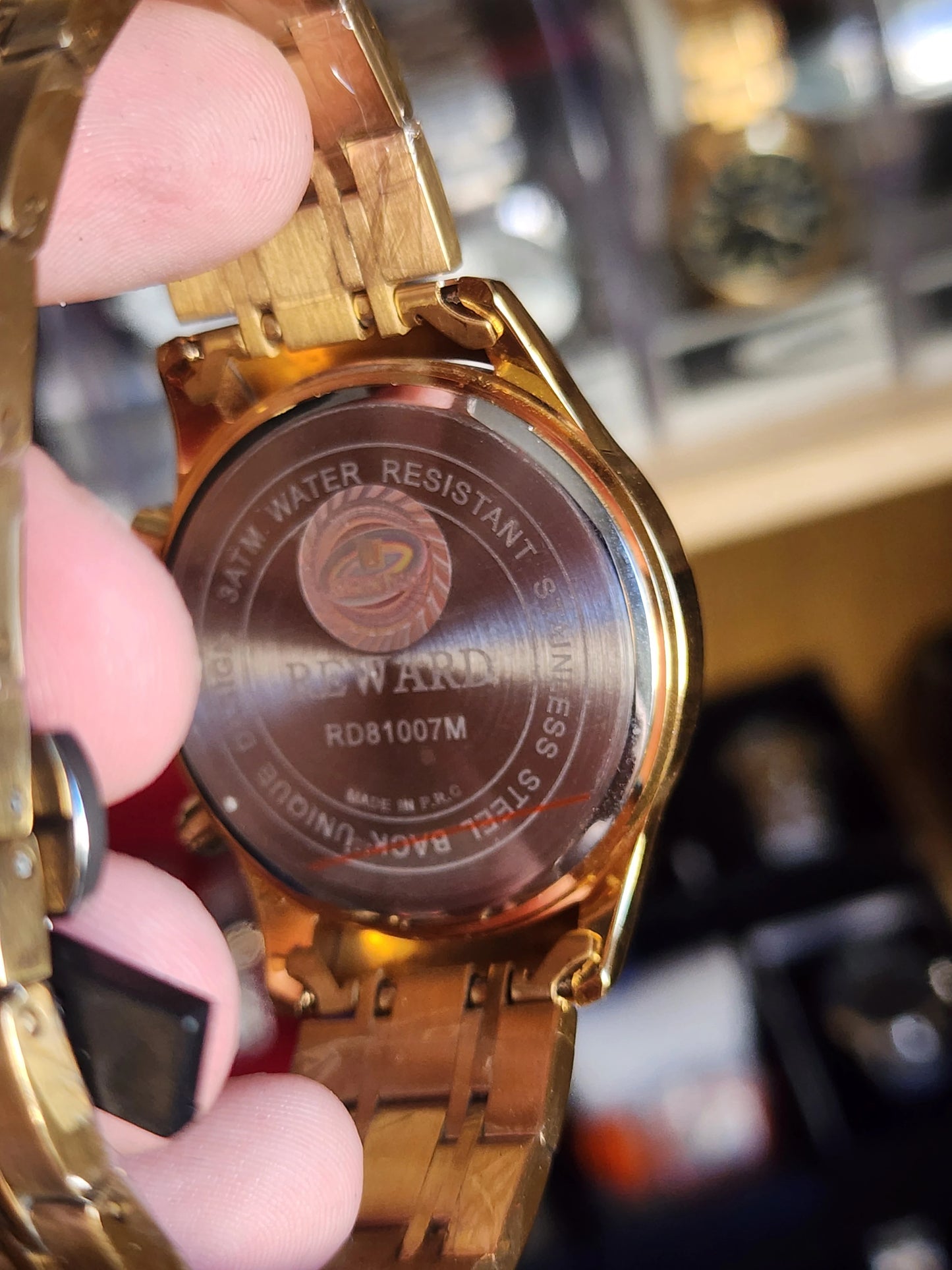 Reward black dial chronograph gold bracelet