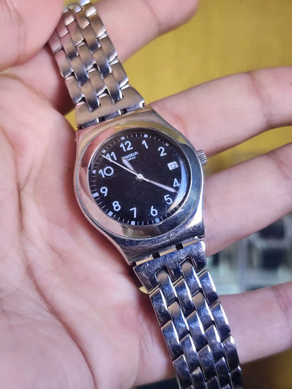 Swatch women black dial