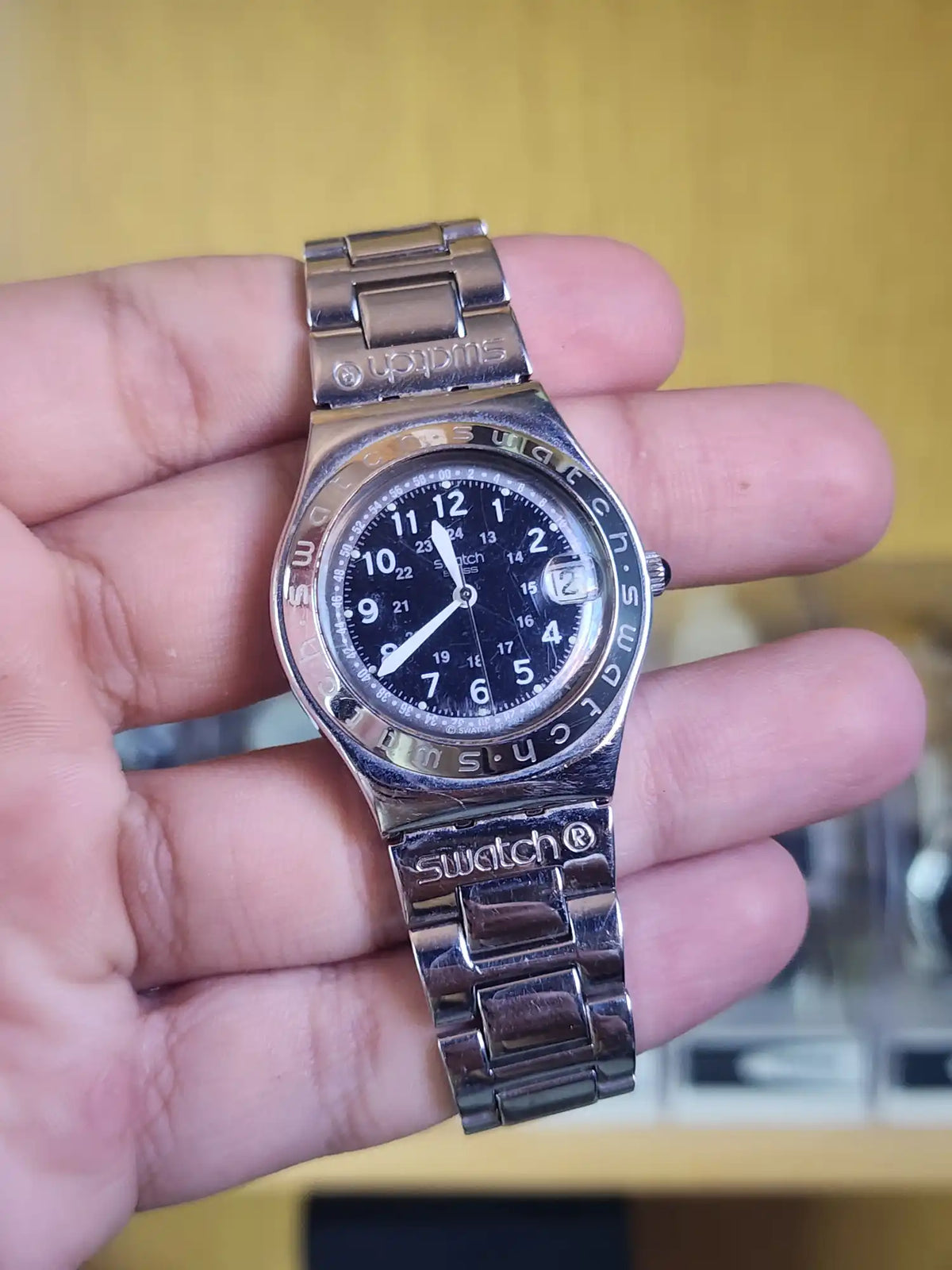 Swatch black dial small numbers women