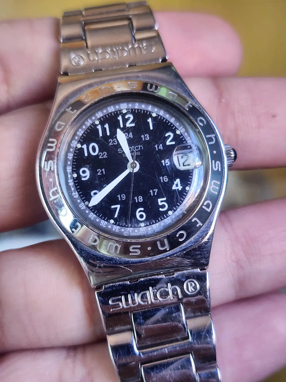 Swatch black dial small numbers women