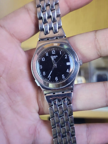 Swatch women black dial