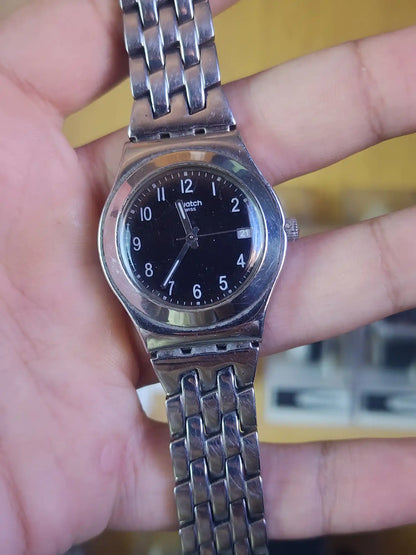 Swatch women black dial