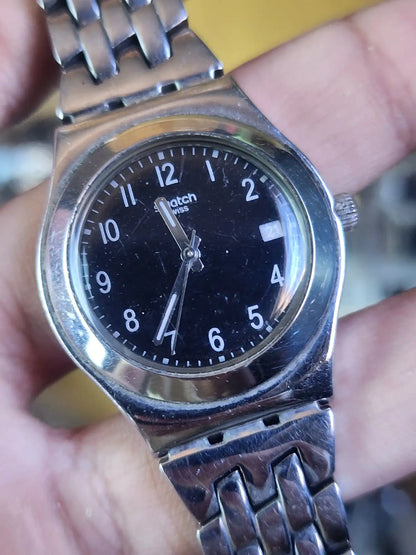 Swatch women black dial