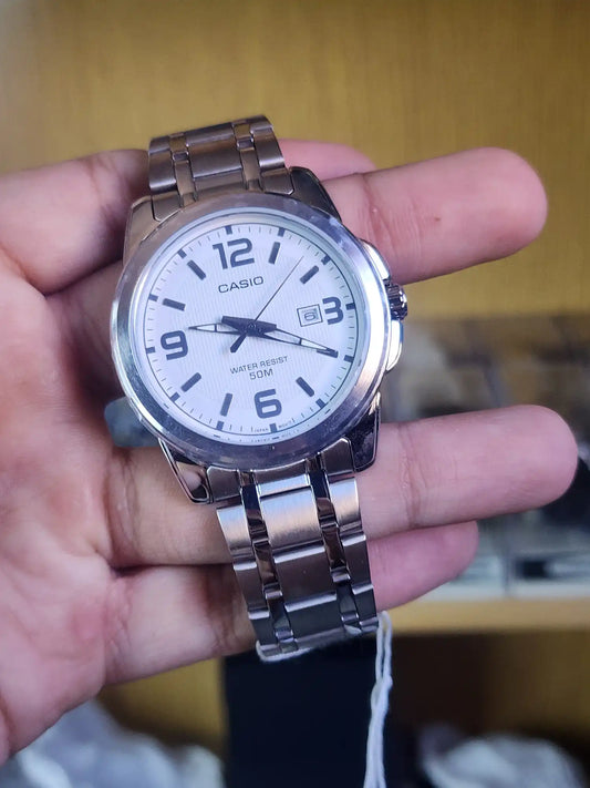 Casio mtp 1314 white dial