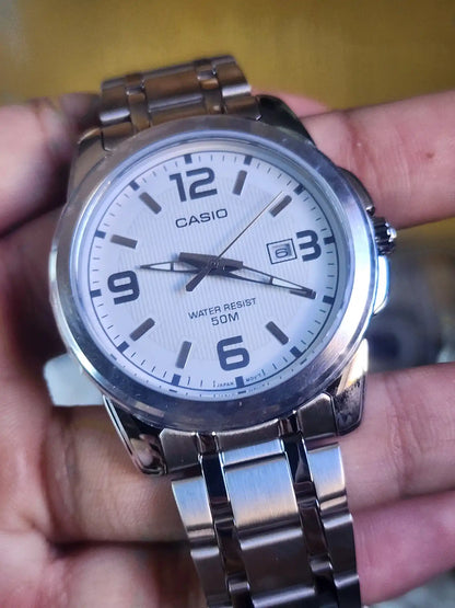 Casio mtp 1314 white dial
