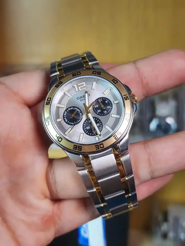 Casio two tone mtp 1300 sg