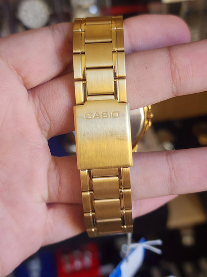 Casio mtp v004 gold black dial