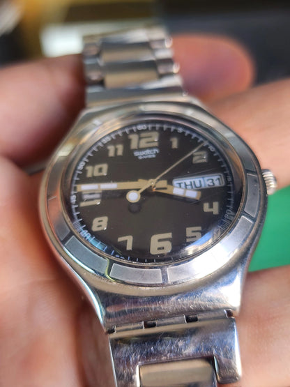 Swatch black dial daydate
