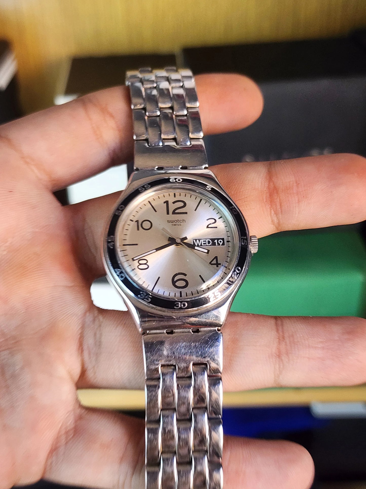 Swatch beige dial black circle