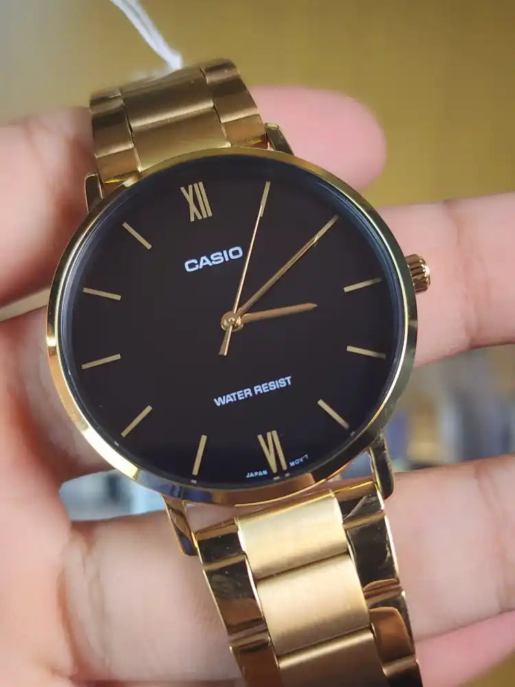 Casio mtp VT01 gold black dial