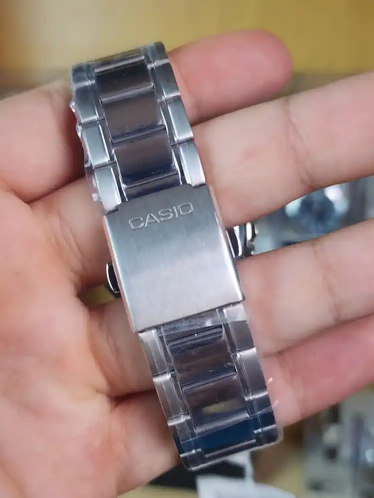 Casio mtp 1374 black blue eyes
