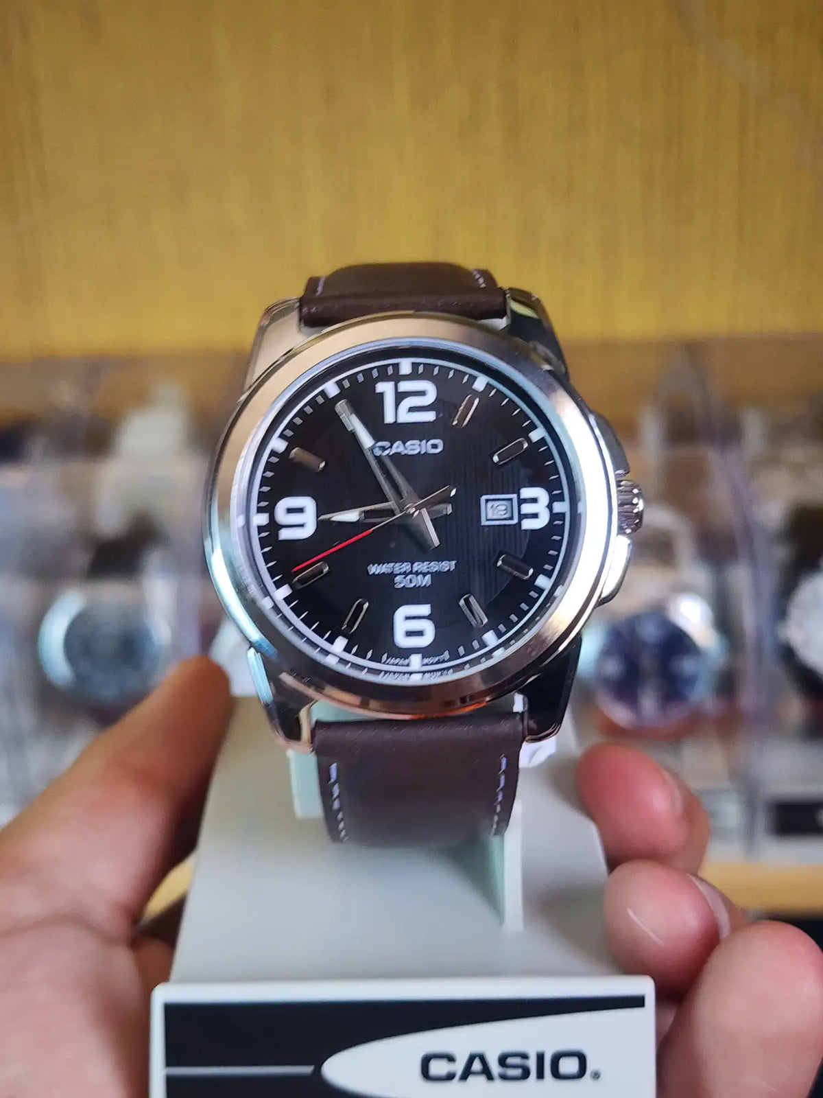 Casio MTP 1314 brown leather black dial