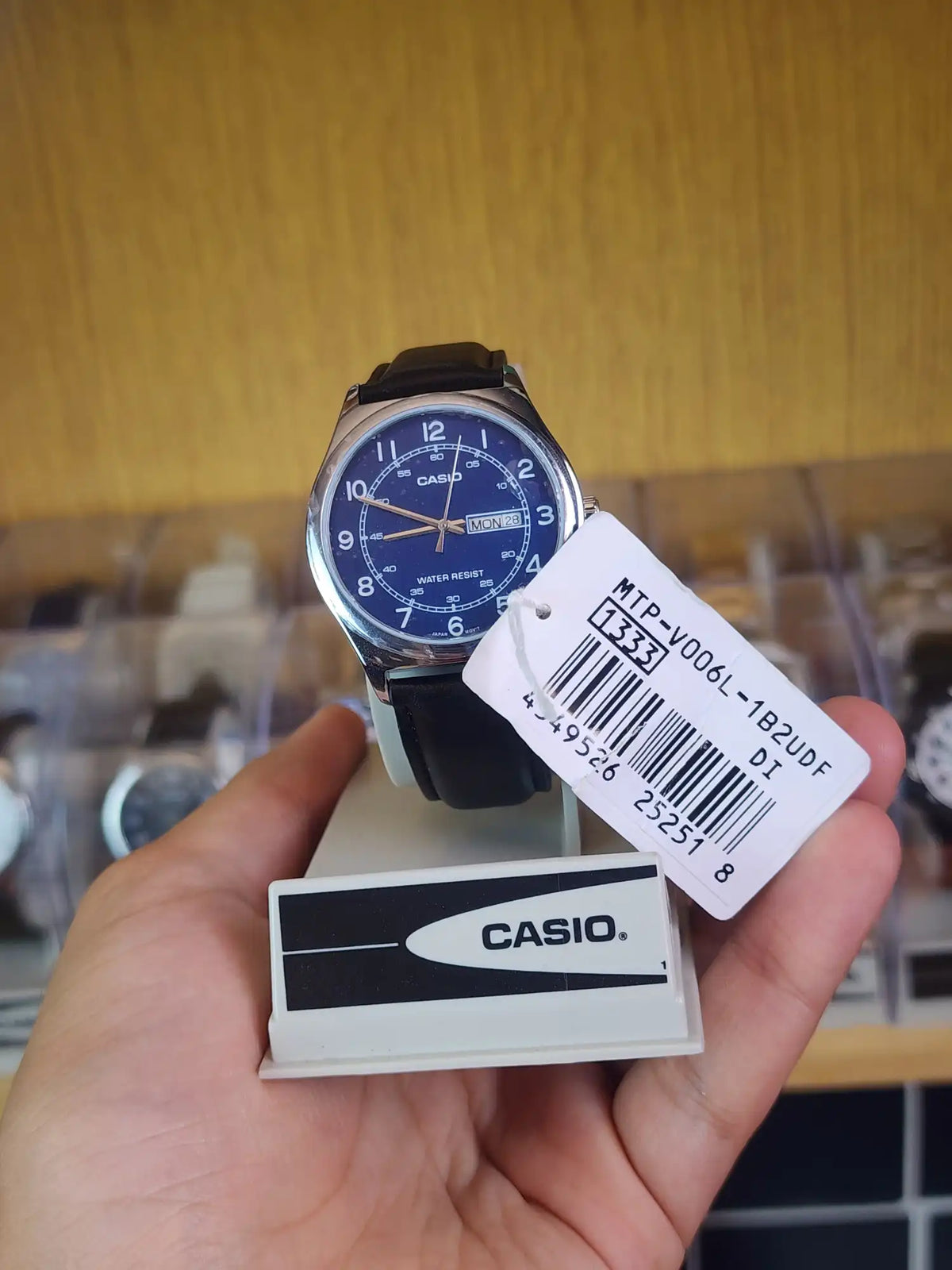 Casio MTP 006 leather blue dial