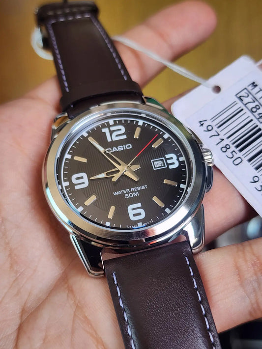 Casio MTP 1314 brown leather black dial