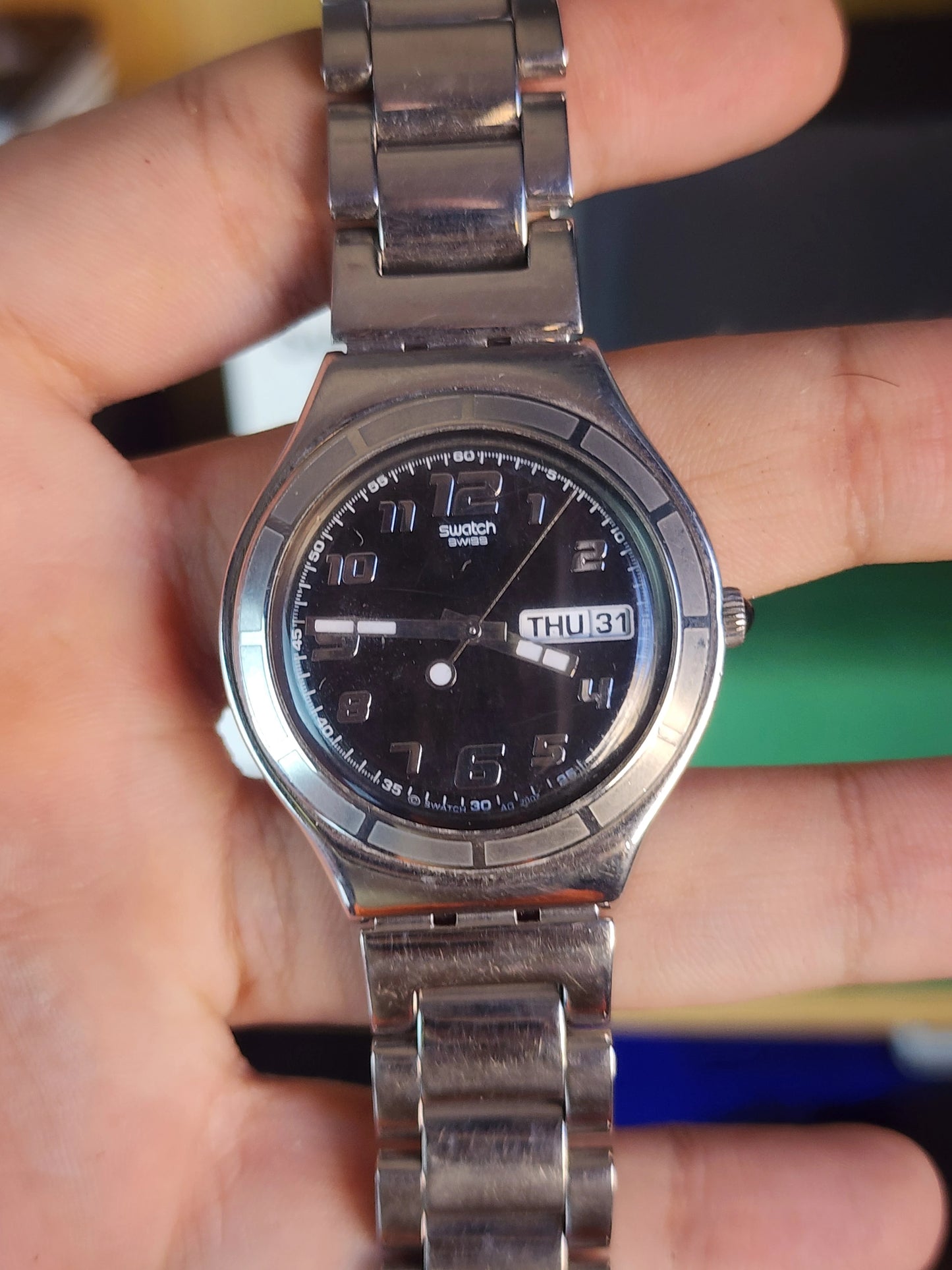 Swatch black dial daydate