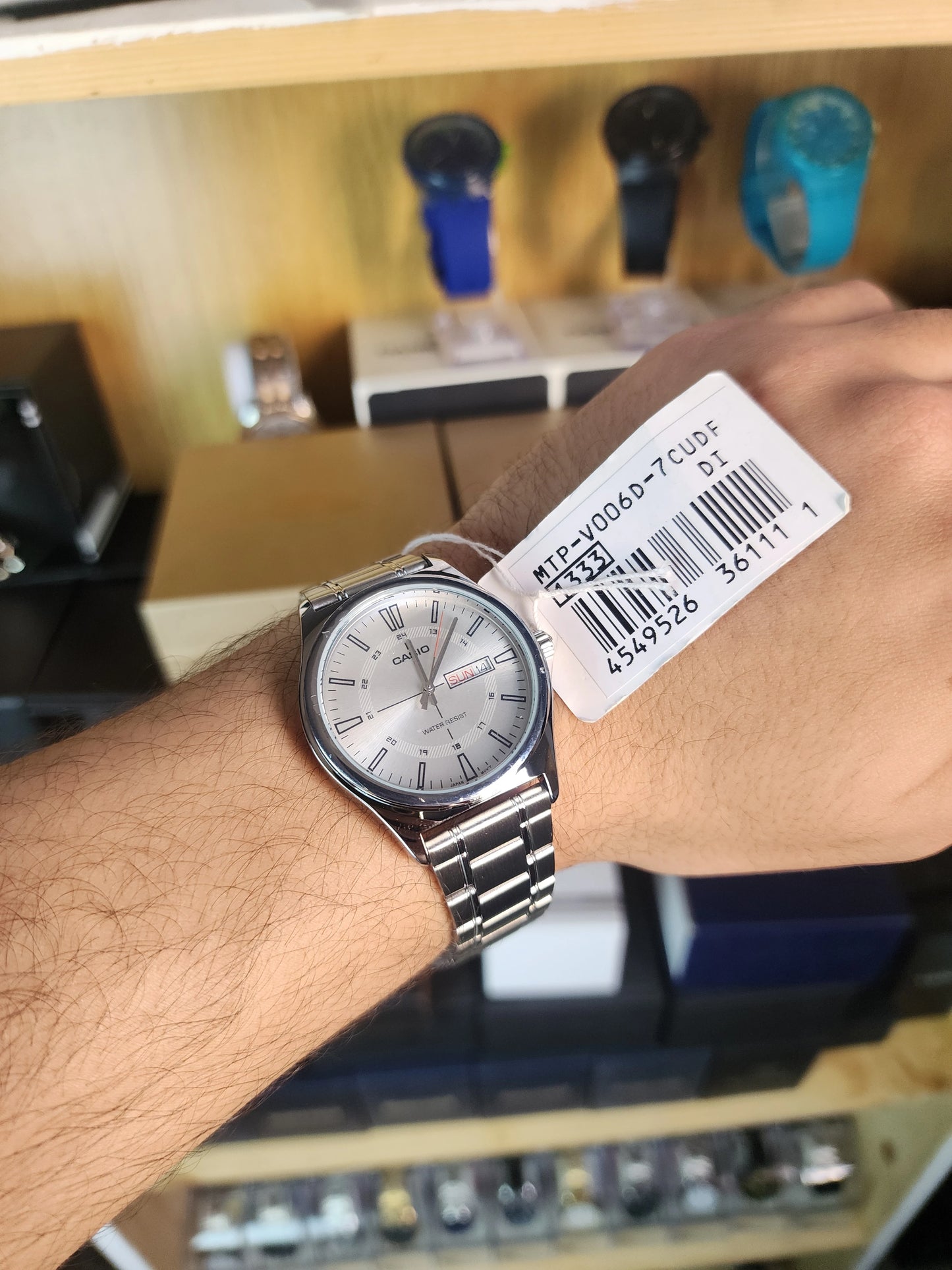 Casio mtp v006 red compass white dial