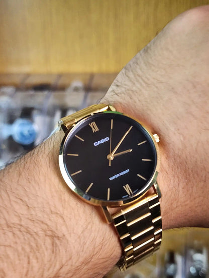 Casio mtp VT01 gold black dial