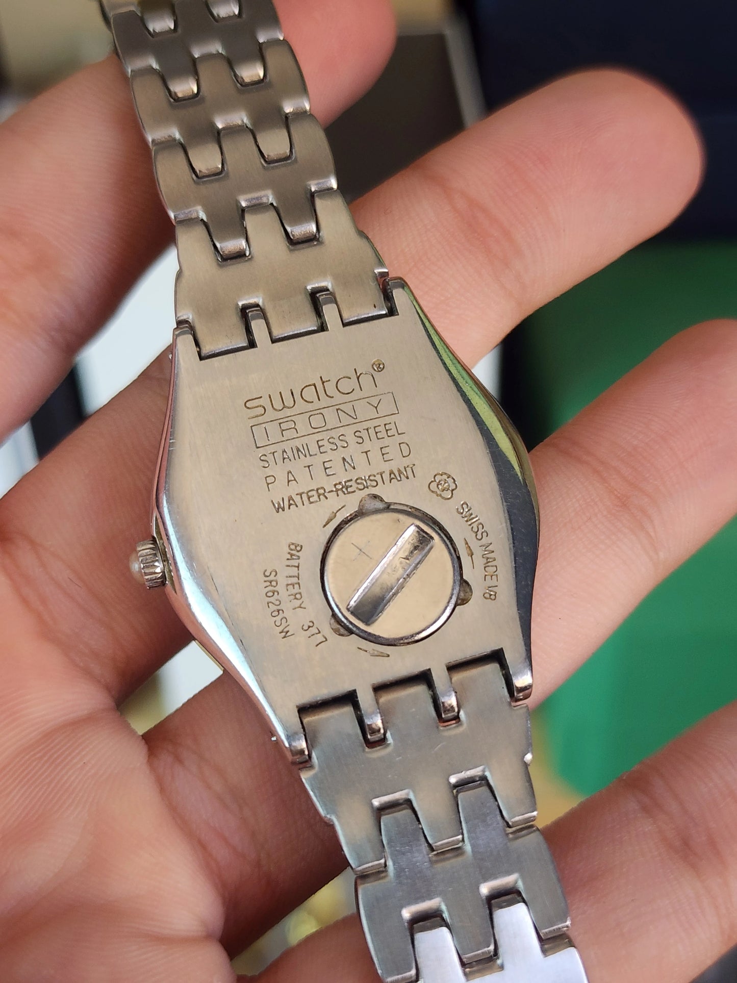 Swatch women half diamond dial