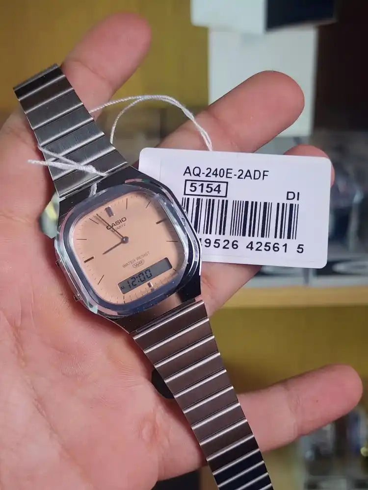 Casio AQ 240E light orange