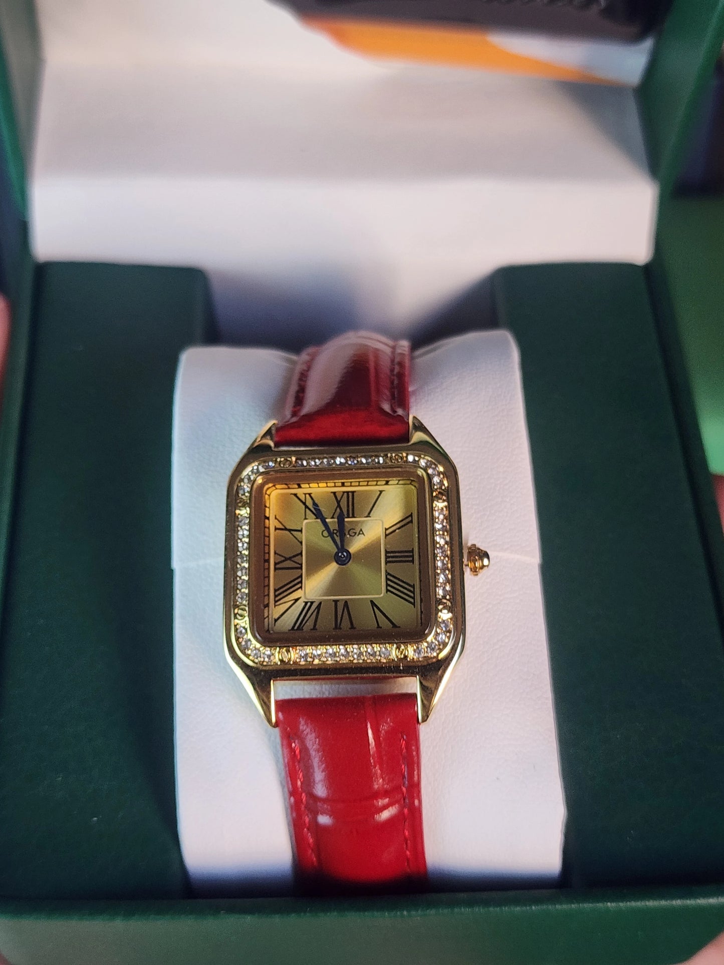ORSGA women red leather gold dial