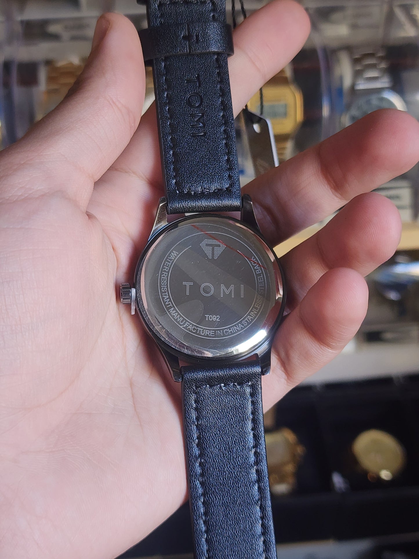 TOMI original black leather black case