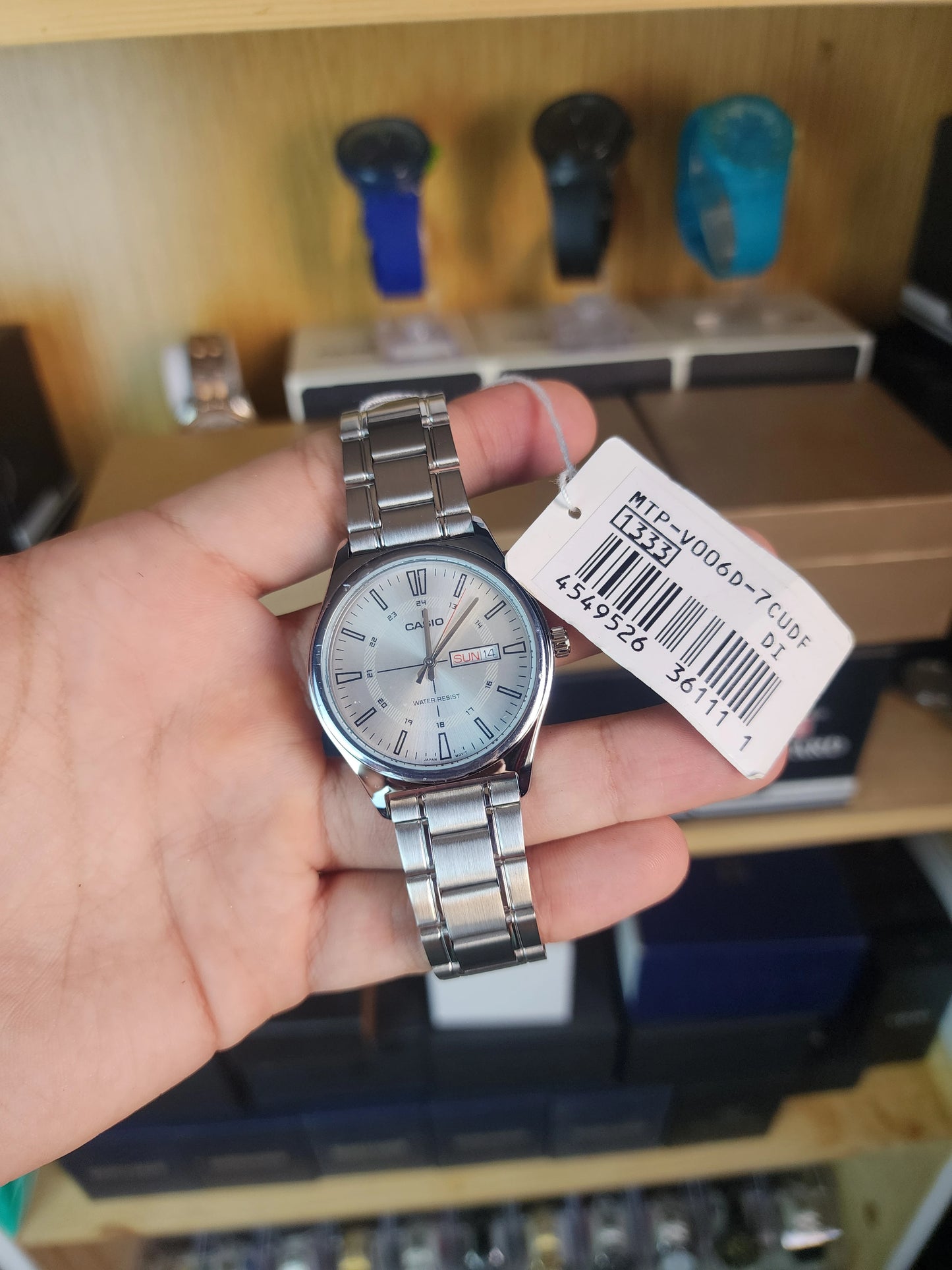 Casio mtp v006 red compass white dial