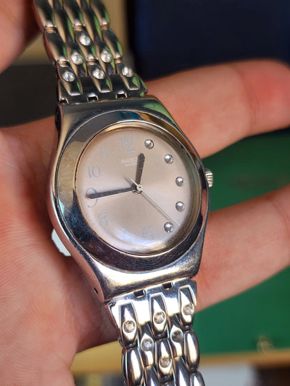 Swatch women half diamond dial