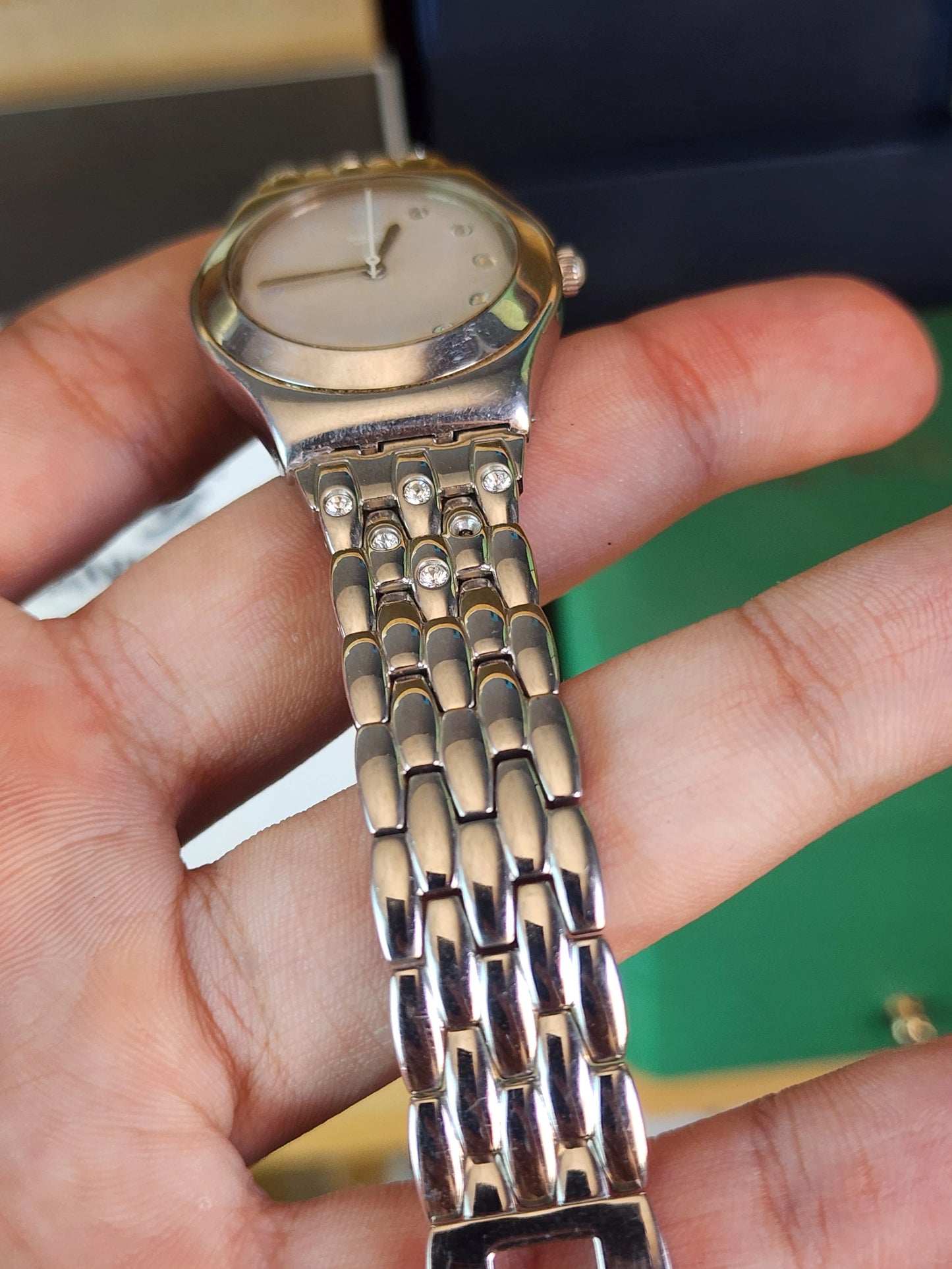 Swatch women half diamond dial
