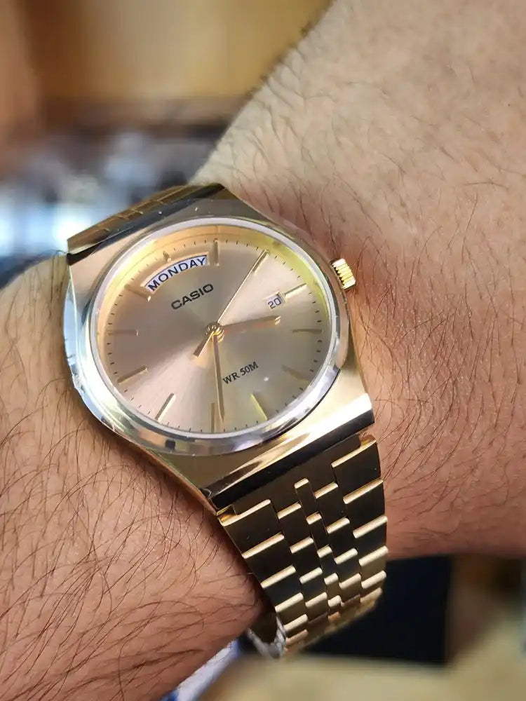 Casio mtp b146 gold daydate