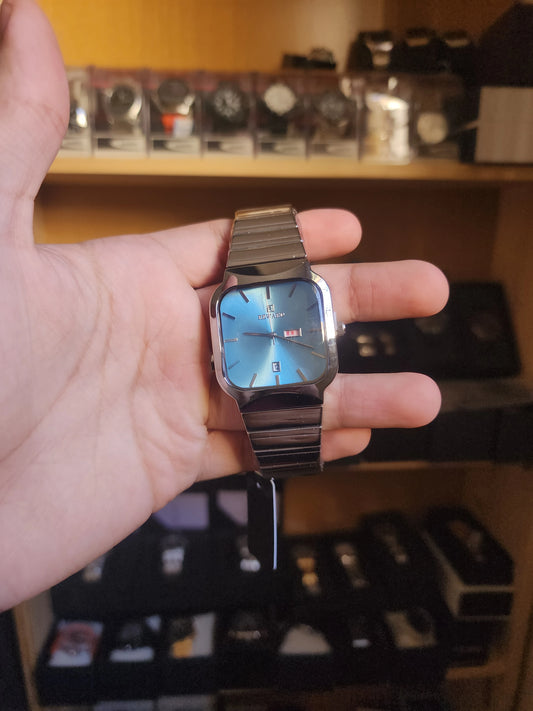 Reward square turquoise dial