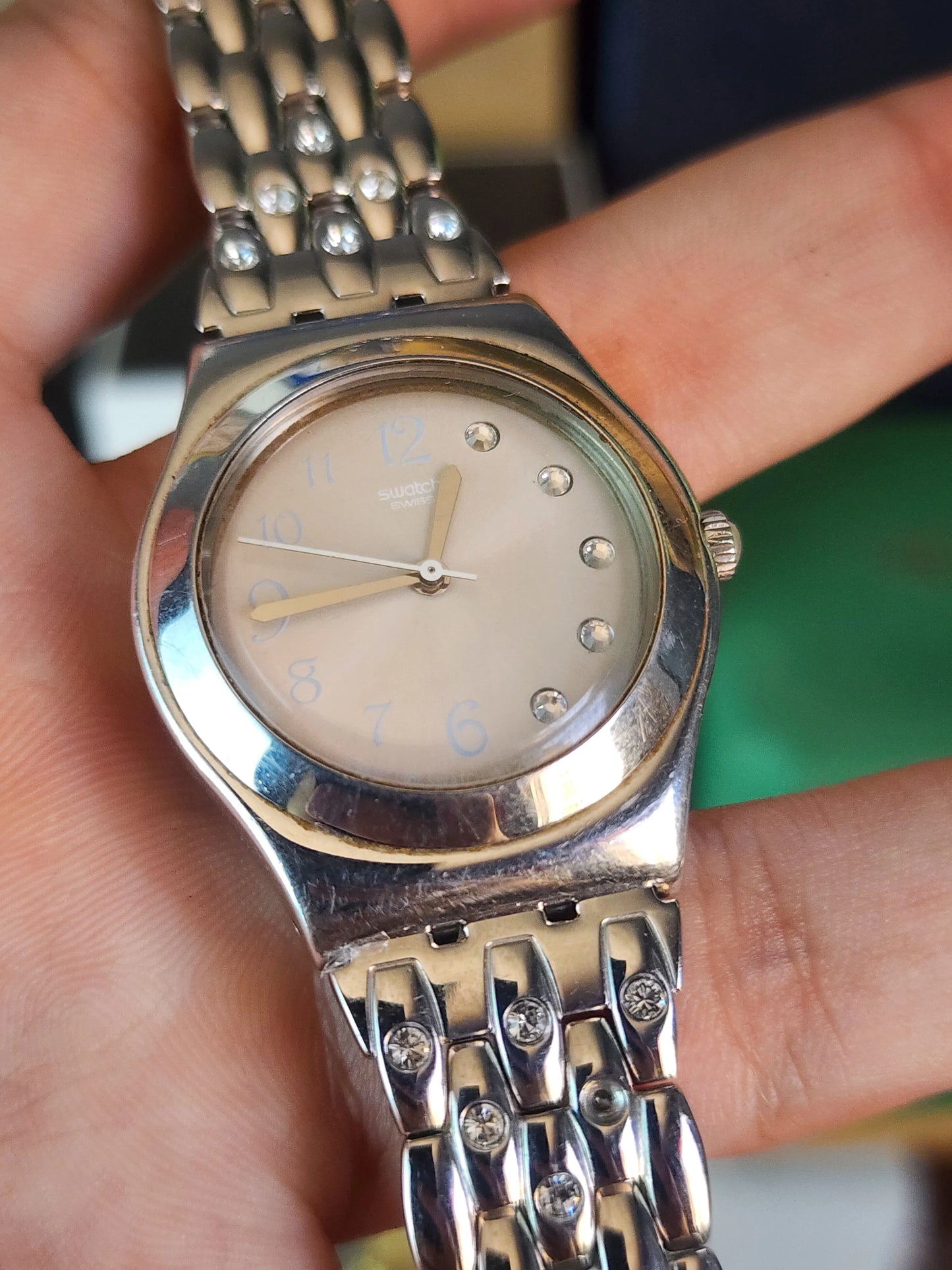 Swatch women half diamond dial