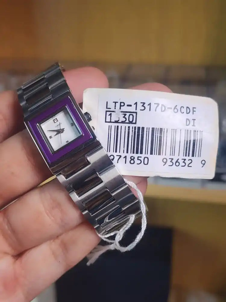 Casio ltp 1317 purple bezel rectangular women