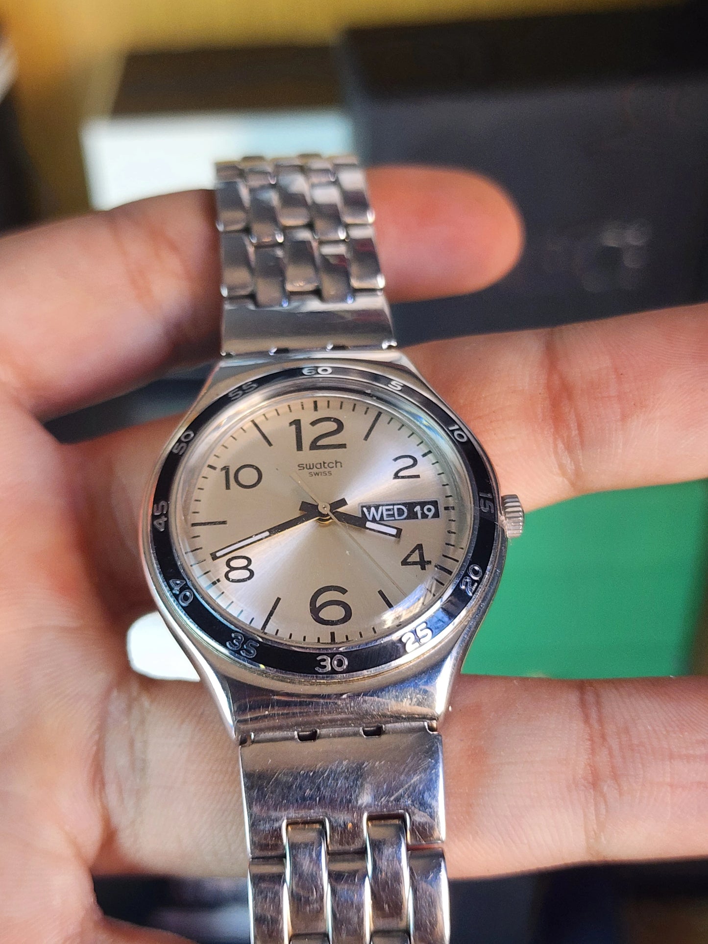 Swatch beige dial black circle