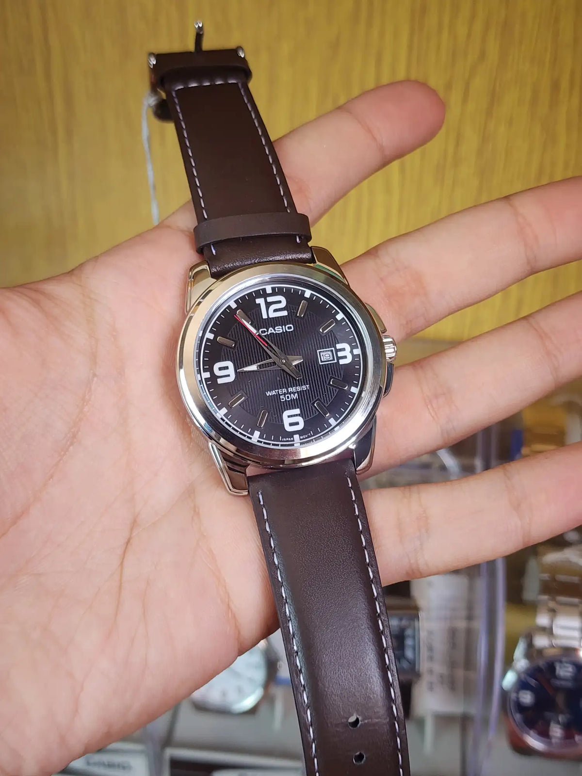 Casio MTP 1314 brown leather black dial