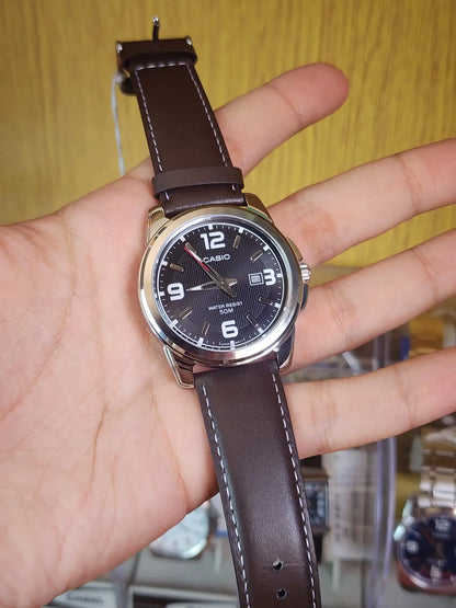 Casio MTP 1314 brown leather black dial