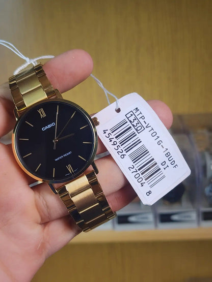 Casio mtp VT01 gold black dial