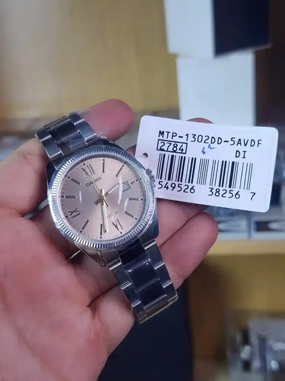 Casio MTP 1302 light beige dial