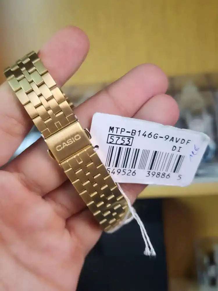 Casio mtp b146 gold daydate