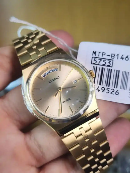 Casio mtp b146 gold daydate